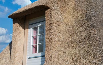 Overseal thatch roof disadvantages